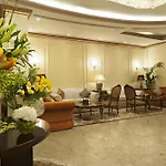 Magnum Hotel & Suites West Bay